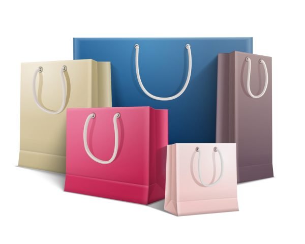 Shopping bag realistic colored composition five colored bags of different sizes on white background vector illustration