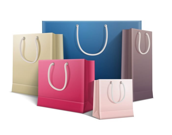 Shopping bag realistic colored composition five colored bags of different sizes on white background vector illustration